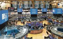  ?? Colin Ziemer / Associated Press ?? The Dow Jones Industrial Average fell 66.84 points to 27,778.07 Tuesday. It remains 6 percent below its record set in February.