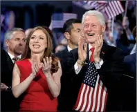  ?? AP/ CAROLYN KASTER ?? Chelsea Clinton and former President Bill Clinton join the applause as Hillary Clinton accepts the Democratic nomination for president.