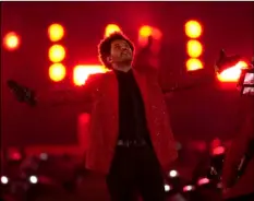  ?? AP Photo/Chris O’Meara ?? The Weeknd performs during the halftime show of the NFL Super Bowl 55 football game between the Kansas City Chiefs and Tampa Bay Buccaneers in Tampa, Fla. on Feb. 7.