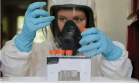  ?? Photograph: The Russian Direct Investment Fu/Reuters ?? A scientist at the Gamaleya Institute during the production and laboratory testing of the Sputnik V vaccine.