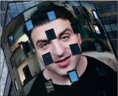  ?? AP Photo/Mark Lennihan ?? In this Dec. 10 file photo, Brian Chesky, CEO of Airbnb, is shown on an electronic screen at the Nasdaq MarketSite in New York.