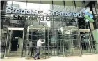  ??  ?? > Standard Chartered is on the road to recovery after a tough five years