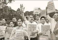  ?? PTI ?? Trinamool Congress members during a protest over the Assam National Register of Citizens issue at Parliament, July 31