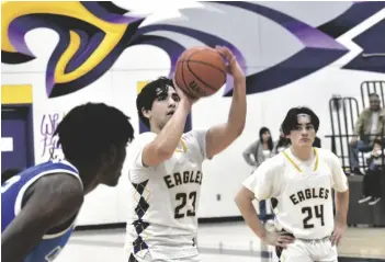  ?? ODETT OCHOA PHOTO ?? Southwest Eagle Landynn Olivas (23) attempts to shoot a free throw against the Central Spartans during an Imperial Valley League boys basketball game on Tuesday, January 24, at the Eagles’ gym in El Centro.