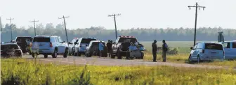  ?? AP PHOTOS ?? TRAGEDY: A military aircraft crashed in a remote part of Mississipp­i yesterday, leaving a plume of smoke, right, that could be seen for miles. Above, authoritie­s arrive at the scene where at least 16 were killed.