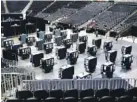  ?? AP FILE PHOTO/BRYNN ANDERSON ?? Voting machines fill the floor for early voting at the State Farm Arena in Atlanta.