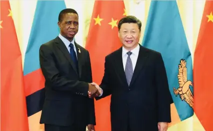  ??  ?? Zambia President Edgar Lungu with his Chinese counterpar­t Xi Jinping in Beijing