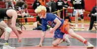  ?? Dave Stewart/Hearst Connecticu­t Media ?? Danbury’s Nick Defonce battles Norwalk’s Nick Fatone during the 138-pound final at the FCIAC wrestling tournament in New Canaan on Saturday.