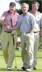  ?? — AFP ?? In this file photo taken on July 6, 2001 president George W Bush (C), former president George Bush (L), and Florida governor Jeb Bush after finishing a round of golf.