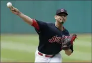  ?? TONY DEJAK — THE ASSOCIATED PRESS ?? Carlos Carrasco delivers in the first inning against the Minnesota Twins on June 16 in Cleveland.