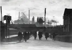  ??  ?? This photograph of staff leaving the Steel Company of Wales works at Port Talbot, West Glamorgan, at the end of an afternoon shift was taken on 24 January 1949