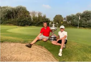  ??  ?? Ed Butler with the War Memorial Trophy, alongside super caddy son Edison