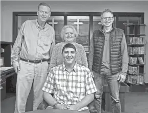  ?? KYLE ROBERTSON/COLUMBUS DISPATCH ?? Robert Scott, 19, center, sits in front of Juvenile Justice staff Steve Telfer, back left, foster mom Rena Shook, back middle, and Youth Pastor Aaron Green, at Faith Memorial Church in Lancaster.