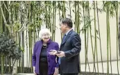  ?? TATAN SYUFLANA / AP ?? U.S. Treasury Secretary Janet Yellen (left) talks with Governor of the People’s Bank of China Pan Gongsheng in Beijing on Monday. Yellen said she addressed China’s industrial overcapaci­ty during talks.