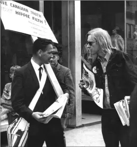  ??  ?? Publisher Dan McLeod (right) was determined to distribute the Georgia Straight in the late 1960s despite repeated harassment from the mayor and his political cronies.