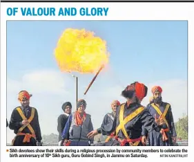  ?? NITIN KANOTRA/HT ?? Sikh devotees show their skills during a religious procession by community members to celebrate the birth anniversar­y of 10th Sikh guru, Guru Gobind Singh, in Jammu on Saturday.