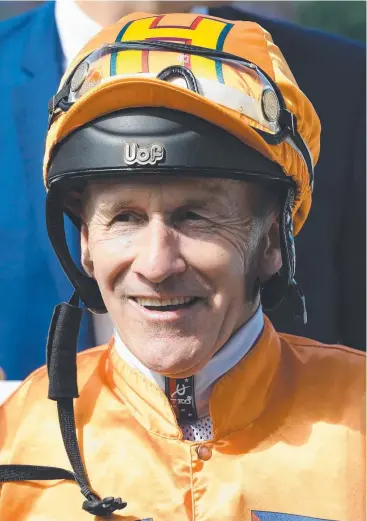  ??  ?? SCEPTIC NO MORE: Jockey Jeff Lloyd is all smiles after riding Tyzone to victory in Race 2 on Gold Coast Cup Day earlier this month. He’ll pilot the Tolga star again today at Doomben. Picture: AAP IMAGE