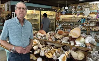  ?? ?? Recreation­al shoppers will find a familiar palette of art, T-shirts, trinkets and the like. Then there are goods with a nautical theme like seashells, which David Thomas has been selling for decades at The Shell Shop.