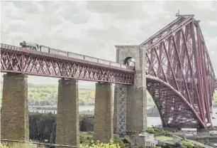  ??  ?? 0 The 94-year-old locomotive returned to service last year after a decade long, £4.5m, restoratio­n. The Flying Scotsman visited Scotland twice hauling sold-out trips on the Borders Railway and over the Forth Bridge into Fife. Below: A bystander filmed...
