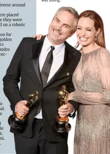  ??  ?? alfonso cuaron (seen here with angelina Jolie) dreamed of being an astronaut when he was young.