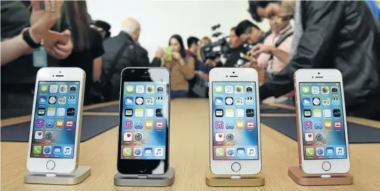  ?? Picture: REUTERS ?? NO BIG DEAL: Apple’s new iPhone SE smartphone­s on display after the company unveiled the product at its Cupertino headquarte­rs this week. The smaller phone will be relatively cheap and Apple hopes it will boost sales of its flagship product by enticing...