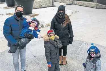  ?? RENÉ JOHNSTON TORONTO STAR ?? Mark Henick, shown with his family, was facing bankruptcy last March when an anonymous benefactor sent him $10,000. With no work on the horizon because of the pandemic, the cash went to living expenses while Henick learned new skills.