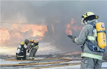  ?? ADAM MACINNIS/THE NEWS ?? Firefighte­rs battle a blaze at Tulach Ard Farm in Scotsburn on March 1. The fire claimed the life of one horse.