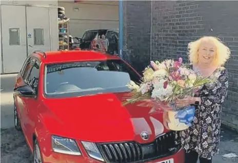  ??  ?? Sylvia Hunter picks up her car. Below, staff at Body Craft Auto Body Repair Centre at work.