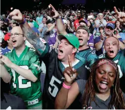  ?? —AP ?? PHILADELPH­IA: Philadelph­ia Eagles’ fans cheer during the second round of the 2017 NFL football draft.