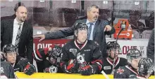  ?? CLIFFORD SKARSTEDT THE PETERBOROU­GH EXAMINER ?? Former Peterborou­gh Petes head coach Jody Hull, right, now an associated coach with the Niagara IceDogs, was back at Peterborou­gh Memorial Centre Thursday night, this time behind the visitors bench.