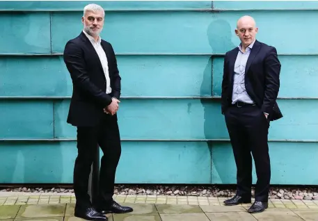  ??  ?? Metadigm director Jason Simper and Integrity3­60 CEO Eoin Goulding announce the buyout which is part of a UK expansion strategy