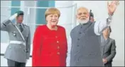  ?? AFP ?? Prime Minister Narendra Modi with German chancellor Angela Merkel in Berlin on Friday.