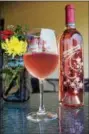  ?? PHOTO BY EMILY RYAN ?? Penns Woods Winery makes this award-winning moscato and merlot blend. Try it with spicy Thai food.