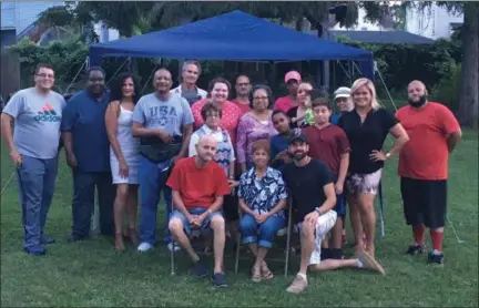  ?? KEVIN MARTIN — THE MORNING JOURNAL ?? Organizers and participan­ts in the three-day Tabernacle Conference 2018 gather at 1852 E. 29th St.