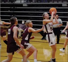  ?? Graham Thomas/Siloam Sunday ?? Siloam Springs senior Sydney Moorman drives to the basket during Friday’s game against Huntsville. Moorman was one of four Lady Panthers to score 11 points in their 58-35 win against the Lady Eagles at Panther Activity Center.