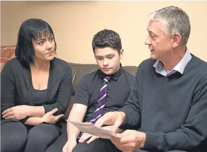  ?? Picture: Steven Brown. ?? Lyndsay French with son Kane Izatt, 13, speaking to Councillor Tom Adams earlier this year about her concerns for the future of speech classes at Mountfleur­ie Primary School.
