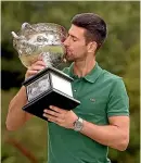  ?? ?? Novak Djokovic kisses the Norman Brookes Challenge Cup the day after winning the 2023 Australian Open.