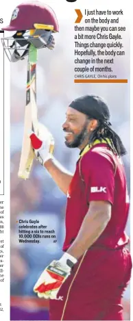  ?? AP ?? ▪ Chris Gayle celebrates after hitting a six to reach 10.000 ODIs runs on Wednesday.