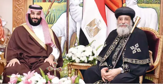  ??  ?? Pope Tawadros II, pope of Egypt’s Coptic Orthodox Church, with Saudi Crown Prince Mohammed bin Salman at the Cathedral of Abbasiya in Cairo on Monday. (AFP)