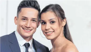  ?? FOTO: DPA ?? Marcel Nguyen und seine Freundin Michelle Timm wollen in Stuttgart WM-Atmosphäre schnuppern.