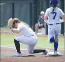  ?? ?? Freshman Makenzie Whalen, No. 9, catches the ball before the Houston Christian runner makes it to first base.