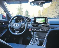  ??  ?? The interior of the 2018 Honda Accord is sleek and well-fitted.