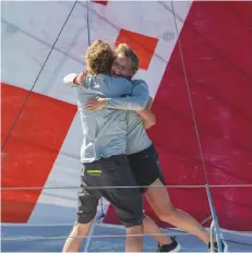  ??  ?? Celebratio­ns with last-minute co-skipper Ysbrand Endt at the finish of their Transat Jacques Vabres