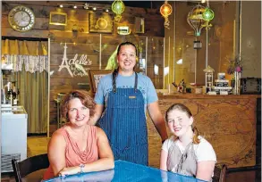  ?? STAFF PHOTO BY DOUG STRICKLAND ?? Co-owners Adelle Pritchard, right, her mother Carla, left, and manager Melissa Christians­en are seen at Adelle's Ice Cream Creperie inside the Granfalloo­n event space on Friday in Chattanoog­a.