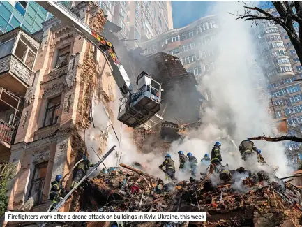  ?? ?? Firefighte­rs work after a drone attack on buildings in Kyiv, Ukraine, this week