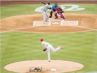  ??  ?? Washington Nationals starting pitcher Max Scherzer throws the first pitch to the New York Yankees’ Aaron Hicks in Washington on Thursday.