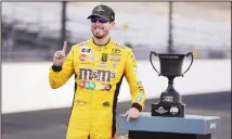  ??  ?? NASCAR Xfinity Series driver Kyle Busch reacts after winning the NASCAR Xfinity auto race at the Indianapol­is Motor Speedway on Sept 7 in
Indianapol­is. (AP)
