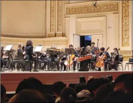  ?? Photo courtesy of Madeline Gaines ?? Novae Sinfonia, an ensemble from the Santa Clarita Youth Orchestra, performs songs at Carnegie Hall in New York recently.