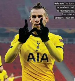  ??  ?? Bale out: The Spurs forward was back to his best with a fine strike in Budapest last night