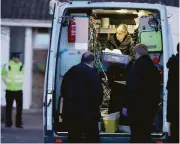  ?? Andrew Matthews / Associated Press ?? Police in Salisbury, England. investigat­e the home of of former Russian double agent Sergei Skripal . He and his daughter were attacked with a nerve agent.